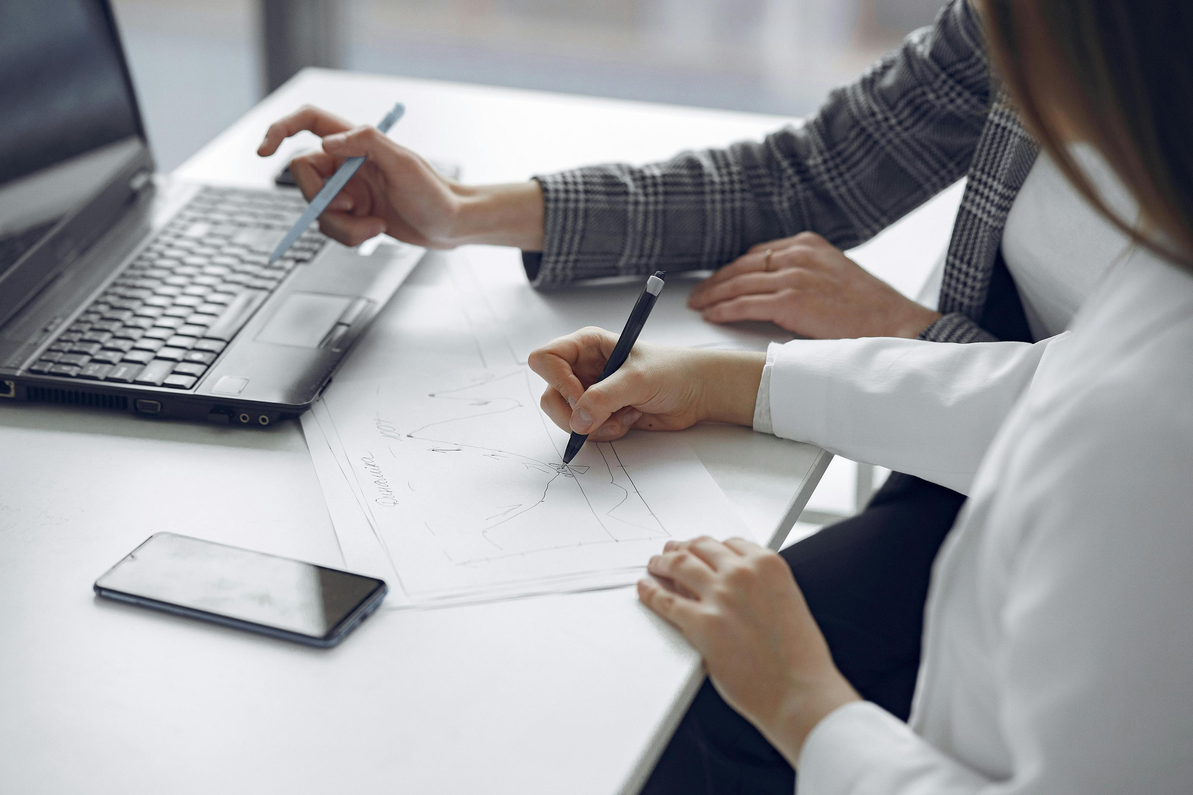 Professionals collaborating on data analysis and planning